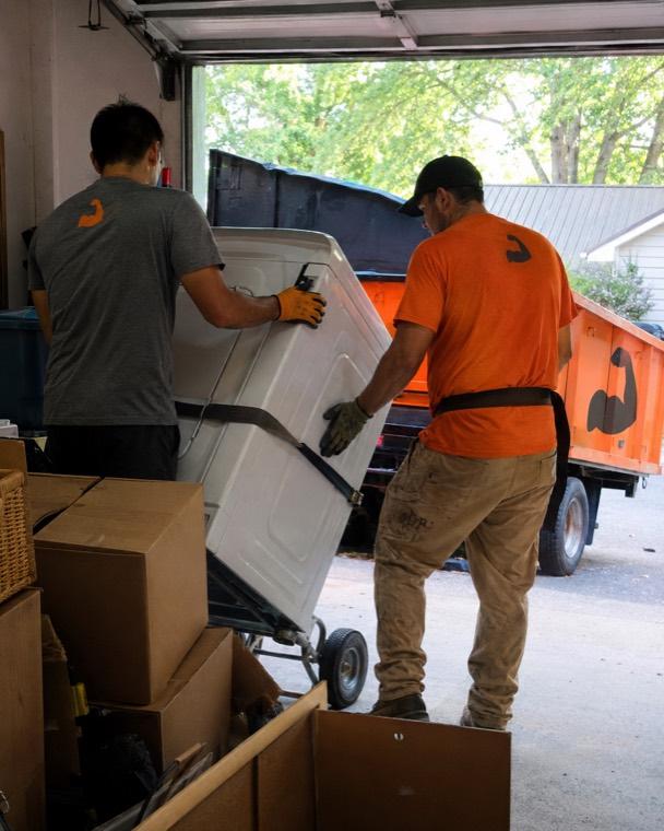 Crew loading items during a junk removal job