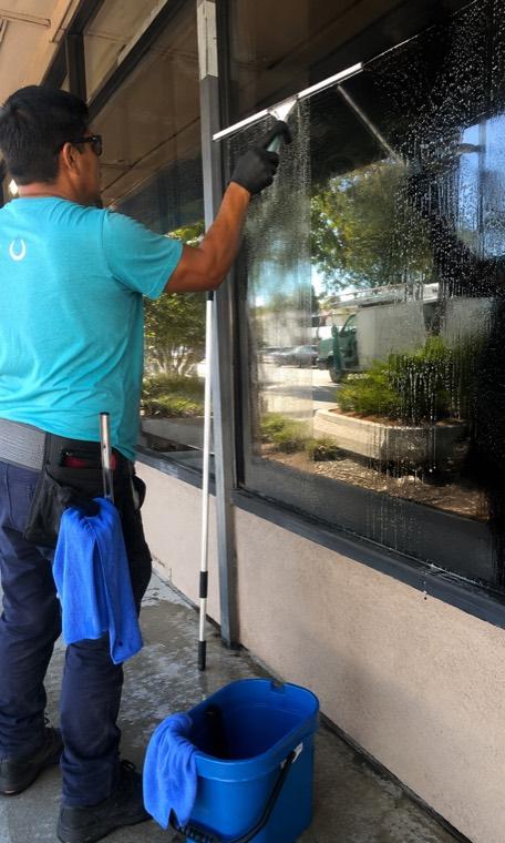 Window cleaner working on exterior glass